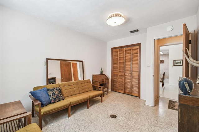620 Marshall St, Altamonte Springs, FL 32701 - sitting room with speckled floor and baseboards