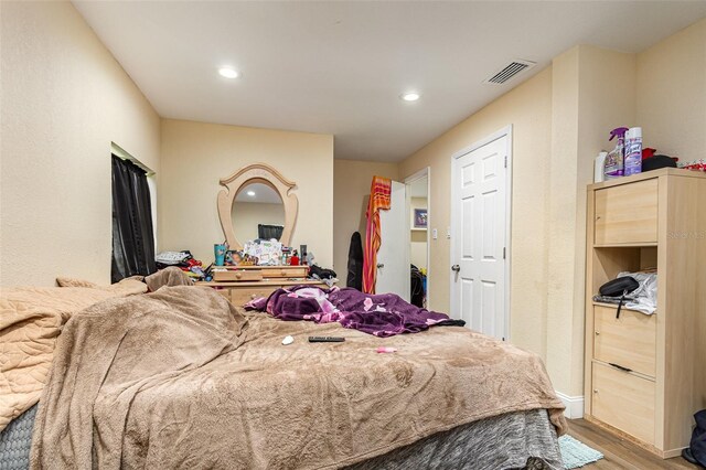 660 6th St, Daytona Beach, FL 32117 - bedroom featuring light wood-style flooring and recessed lighting