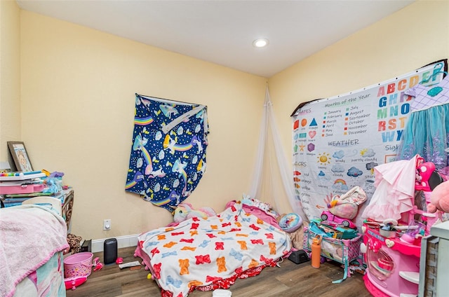 660 6th St, Daytona Beach, FL 32117 - bedroom with wood finished floors and recessed lighting