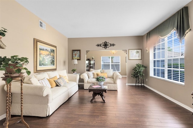 2214 Westbourne Dr, Oviedo, FL 32765 - living room with plenty of natural light, dark wood-style flooring, and baseboards