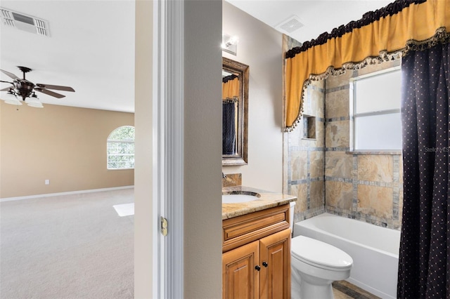 2214 Westbourne Dr, Oviedo, FL 32765 - full bath with ceiling fan, vanity, toilet, shower / tub combo with curtain, and baseboards