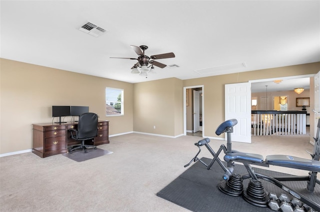 2214 Westbourne Dr, Oviedo, FL 32765 - workout room with attic access, a ceiling fan, carpet flooring, and baseboards