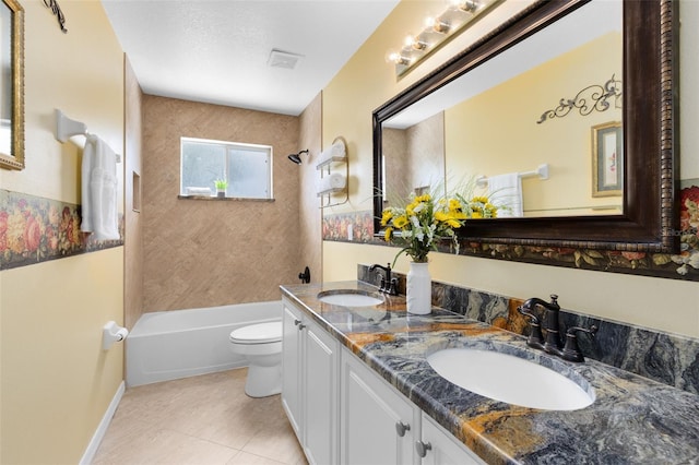 2214 Westbourne Dr, Oviedo, FL 32765 - full bathroom featuring toilet, double vanity, tub / shower combination, tile patterned floors, and baseboards