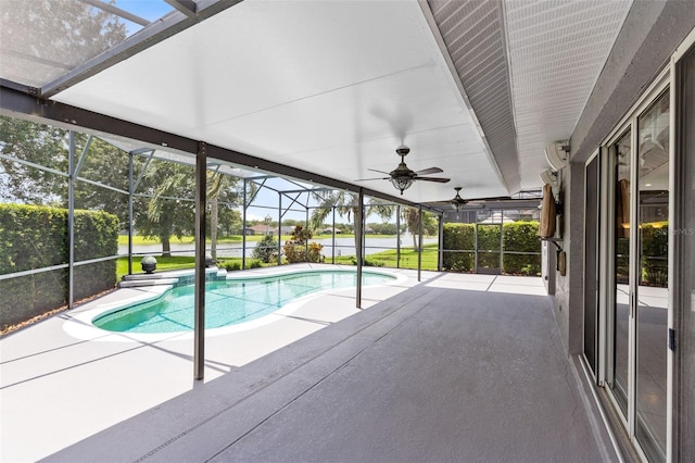 2214 Westbourne Dr, Oviedo, FL 32765 - outdoor pool featuring a patio, glass enclosure, and a ceiling fan