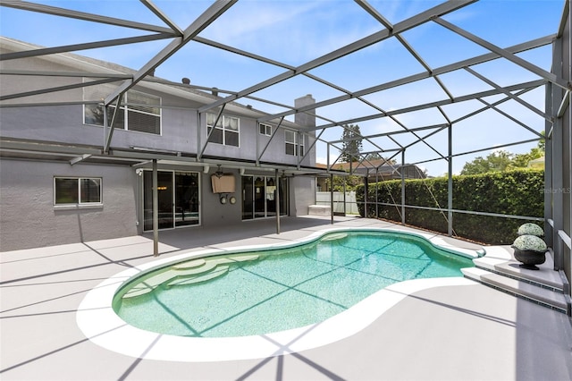 2214 Westbourne Dr, Oviedo, FL 32765 - view of swimming pool featuring a patio and glass enclosure