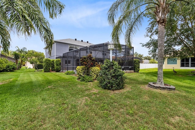 2214 Westbourne Dr, Oviedo, FL 32765 - view of grassy yard with a lanai