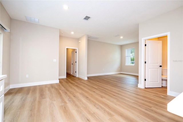 1331 19th St, Orlando, FL 32805 - empty room with light wood-type flooring, recessed lighting, and baseboards