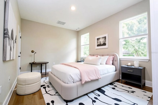 1331 19th St, Orlando, FL 32805 - bedroom featuring wood finished floors, baseboards, and recessed lighting