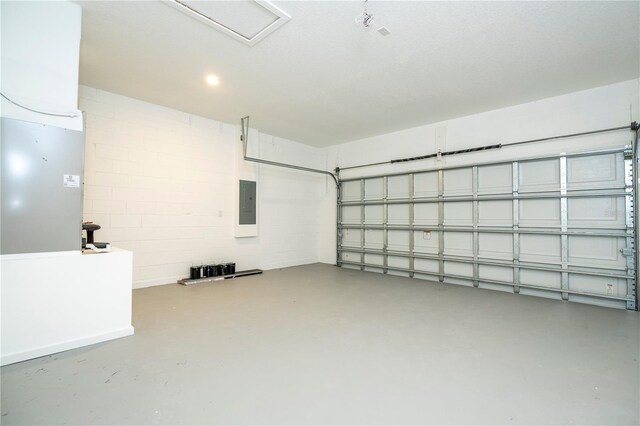 1331 19th St, Orlando, FL 32805 - garage featuring electric panel and concrete block wall