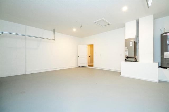 1331 19th St, Orlando, FL 32805 - garage featuring electric water heater and recessed lighting