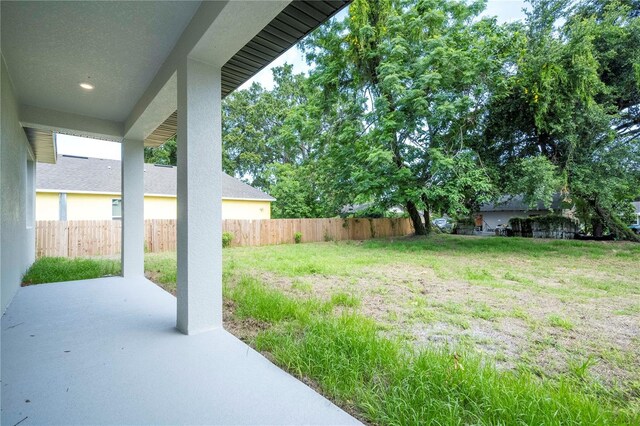 1331 19th St, Orlando, FL 32805 - view of yard with a patio
