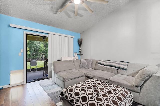 116 Candlewick Ct, Sanford, FL 32771 - living area with ceiling fan, a textured ceiling, wood finished floors, and vaulted ceiling