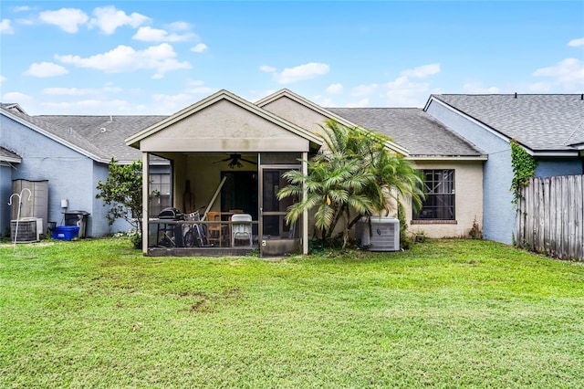 116 Candlewick Ct, Sanford, FL 32771 - rear view of house featuring a ceiling fan, a sunroom, a shingled roof, and central air condition unit