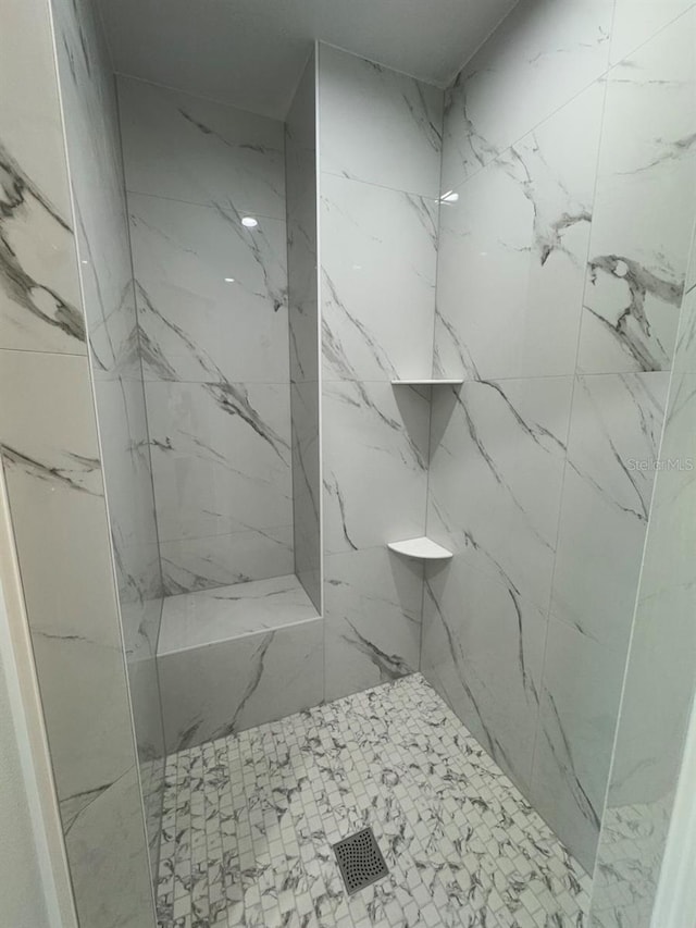 9 Bunker Pl, Rotonda West, FL 33947 - bathroom with a marble finish shower