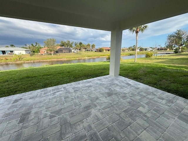 9 Bunker Pl, Rotonda West, FL 33947 - view of patio with a water view and a residential view