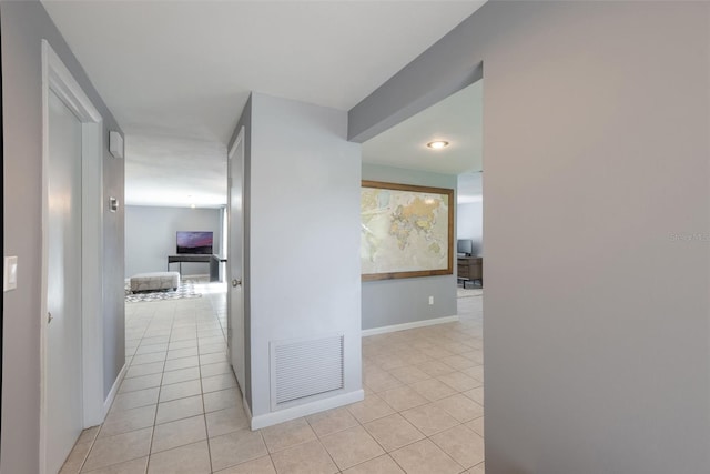 1343 Charlotte St, Altamonte Springs, FL 32701 - hallway featuring light tile patterned floors and baseboards
