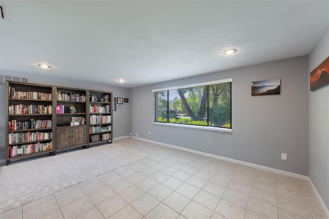 1343 Charlotte St, Altamonte Springs, FL 32701 - unfurnished room with light tile patterned floors, recessed lighting, and baseboards