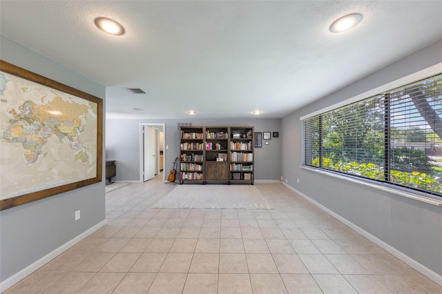 1343 Charlotte St, Altamonte Springs, FL 32701 - empty room featuring baseboards and light tile patterned floors
