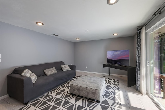 1343 Charlotte St, Altamonte Springs, FL 32701 - living area with tile patterned flooring, recessed lighting, and baseboards