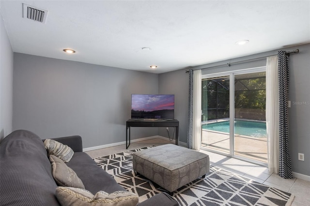 1343 Charlotte St, Altamonte Springs, FL 32701 - living area with baseboards, tile patterned floors, and recessed lighting