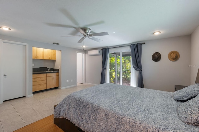 1343 Charlotte St, Altamonte Springs, FL 32701 - bedroom featuring an AC wall unit, light tile patterned floors, a sink, access to outside, and ceiling fan