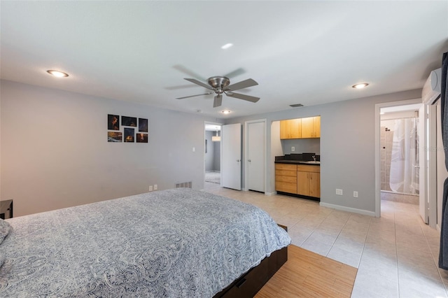 1343 Charlotte St, Altamonte Springs, FL 32701 - bedroom featuring recessed lighting, light tile patterned floors, ensuite bath, and ceiling fan