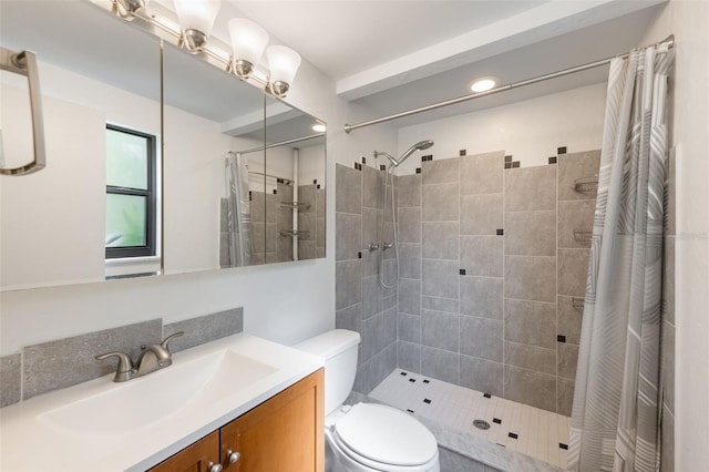 1343 Charlotte St, Altamonte Springs, FL 32701 - bathroom featuring vanity, toilet, a tile shower, and recessed lighting