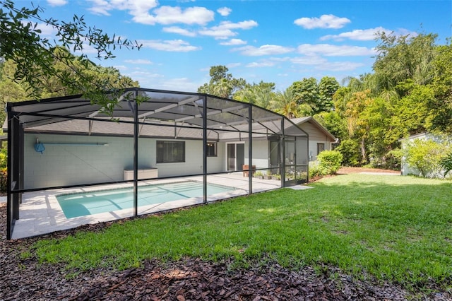 1343 Charlotte St, Altamonte Springs, FL 32701 - back of house featuring a lawn, an outdoor pool, a patio, and a lanai