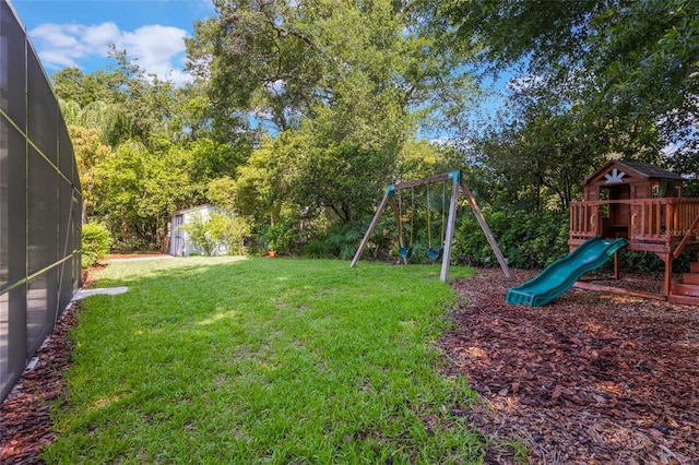 1343 Charlotte St, Altamonte Springs, FL 32701 - view of grassy yard featuring a playground and a lanai