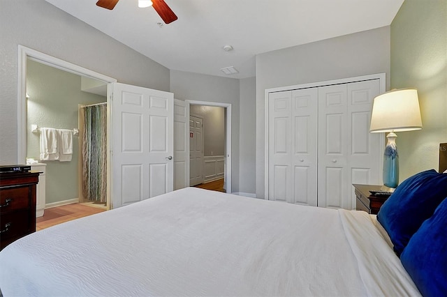 4816 Tidecrest Ave Unit 178, Orlando, FL 32819 - bedroom featuring wood finished floors, a closet, baseboards, ensuite bathroom, and ceiling fan