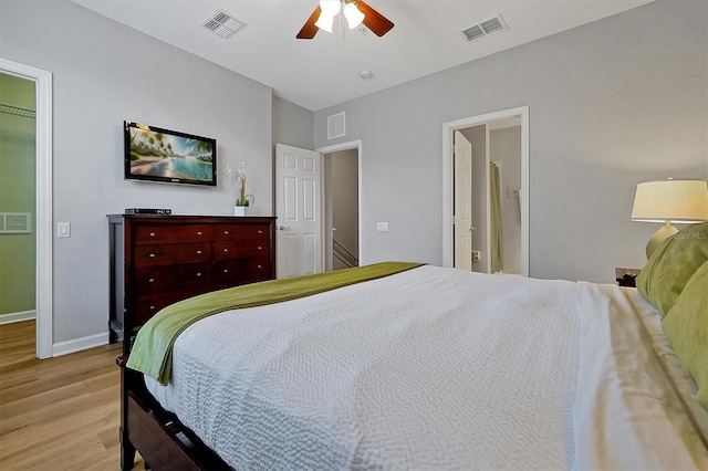 4816 Tidecrest Ave Unit 178, Orlando, FL 32819 - bedroom featuring light wood finished floors, baseboards, ceiling fan, and connected bathroom