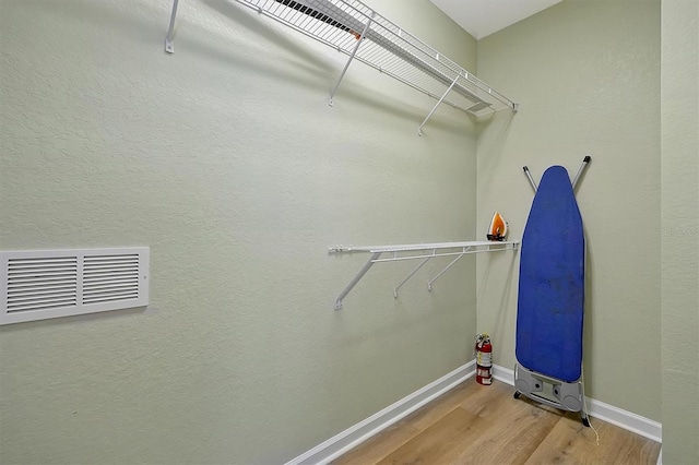 4816 Tidecrest Ave Unit 178, Orlando, FL 32819 - spacious closet with wood finished floors
