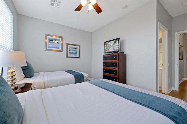 4816 Tidecrest Ave Unit 178, Orlando, FL 32819 - bedroom with wood finished floors, baseboards, and a ceiling fan