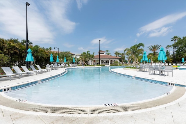 4816 Tidecrest Ave Unit 178, Orlando, FL 32819 - community pool with a patio