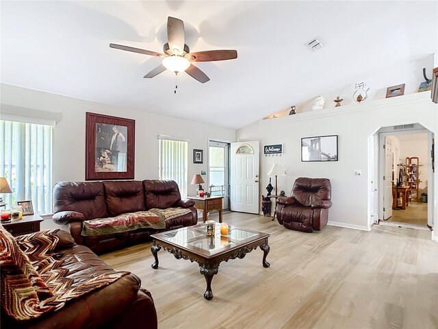 2771 NE 66th St, Ocala, FL 34479 - living area featuring a ceiling fan, light wood finished floors, lofted ceiling, and baseboards
