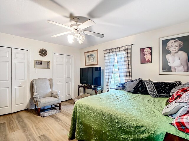 2771 NE 66th St, Ocala, FL 34479 - bedroom with multiple closets, light wood-type flooring, and ceiling fan