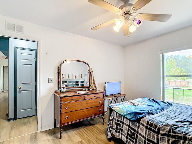 2771 NE 66th St, Ocala, FL 34479 - bedroom featuring light wood finished floors and ceiling fan