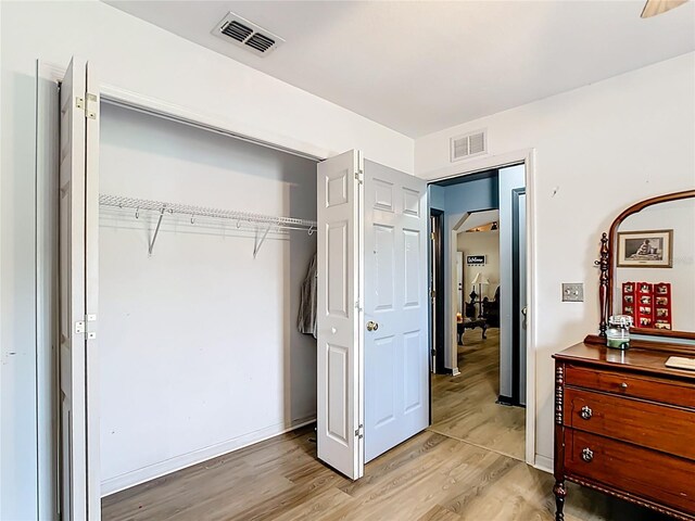2771 NE 66th St, Ocala, FL 34479 - bedroom featuring light wood-style floors and a closet