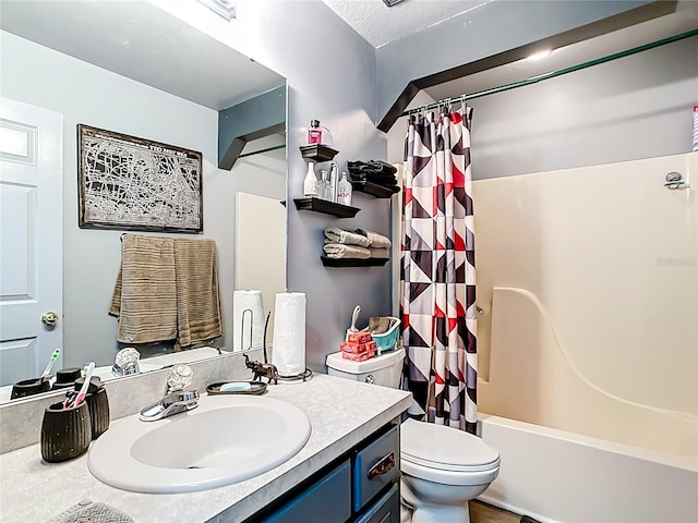 2771 NE 66th St, Ocala, FL 34479 - full bathroom featuring vanity, toilet, and shower / bathtub combination with curtain