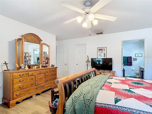 2771 NE 66th St, Ocala, FL 34479 - bedroom with light wood-style floors and ceiling fan