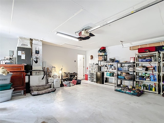 2771 NE 66th St, Ocala, FL 34479 - garage featuring a garage door opener