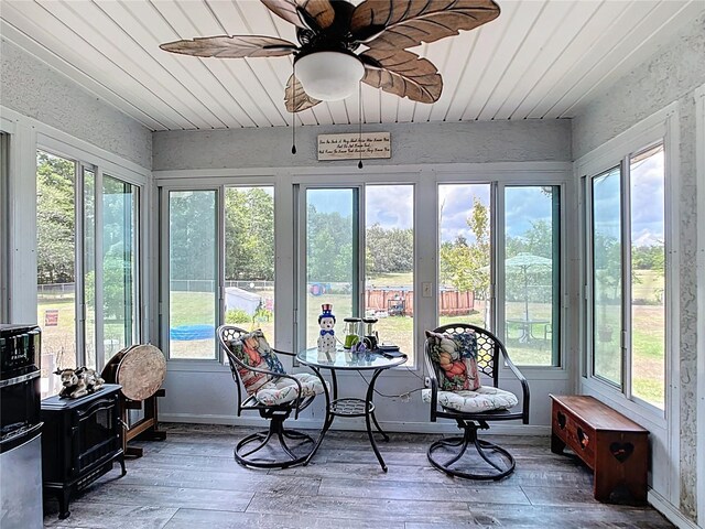 2771 NE 66th St, Ocala, FL 34479 - sunroom featuring hardwood / wood-style floors, wood ceiling, and a deck