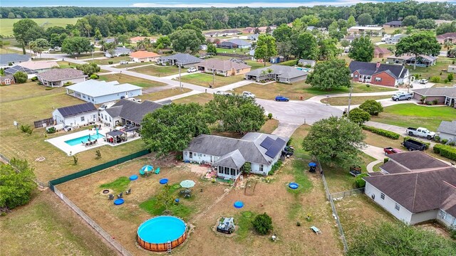 2771 NE 66th St, Ocala, FL 34479 - aerial view of residential area featuring a pool
