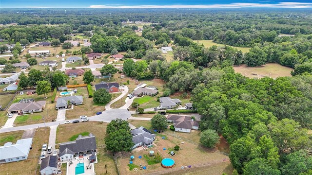 2771 NE 66th St, Ocala, FL 34479 - aerial view of property and surrounding area with nearby suburban area and a heavily wooded area