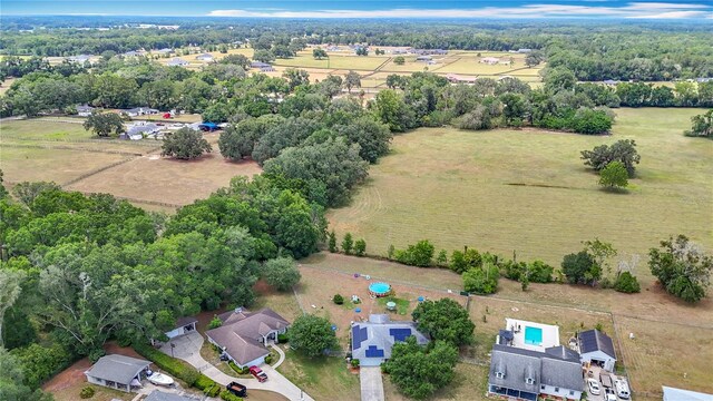 2771 NE 66th St, Ocala, FL 34479 - aerial overview of property's location with rural landscape