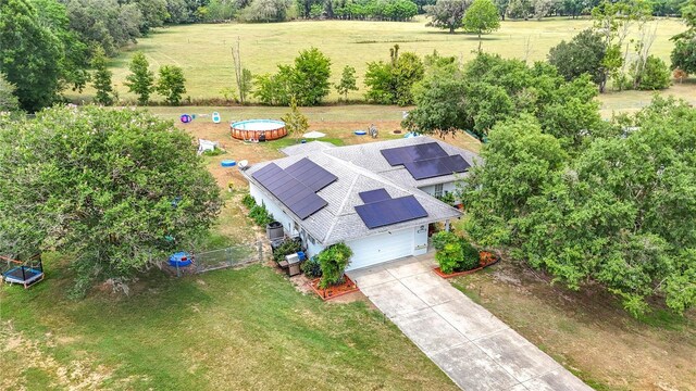 2771 NE 66th St, Ocala, FL 34479 - aerial view of property and surrounding area featuring a tree filled landscape