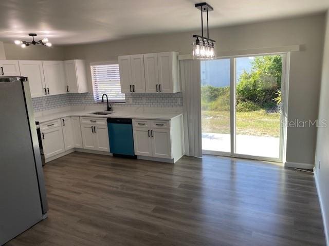 1750 Mitten Ter, Deltona, FL 32738 - kitchen featuring dishwasher, freestanding refrigerator, a chandelier, and a sink