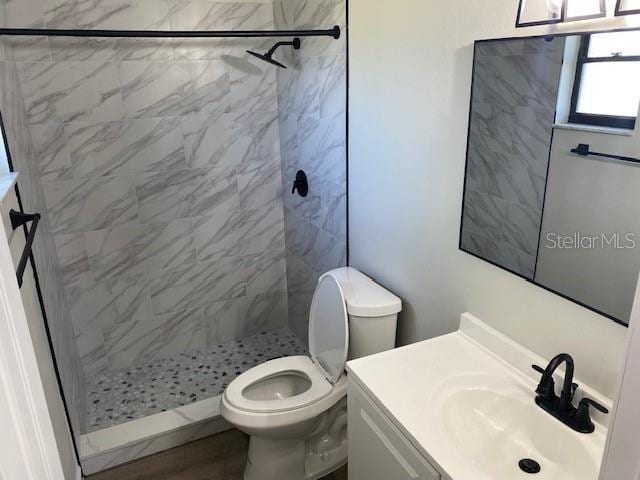 1750 Mitten Ter, Deltona, FL 32738 - full bath with vanity, a tile shower, and toilet