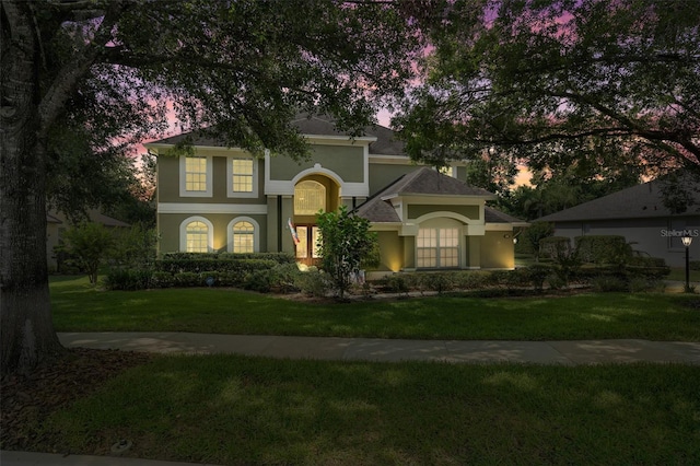 490 Wekiva Preserve Dr, Apopka, FL 32712 - view of front of property with stucco siding, a front lawn, and roof with shingles
