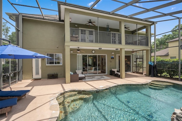 490 Wekiva Preserve Dr, Apopka, FL 32712 - rear view of house with ceiling fan, a balcony, stucco siding, and a patio area